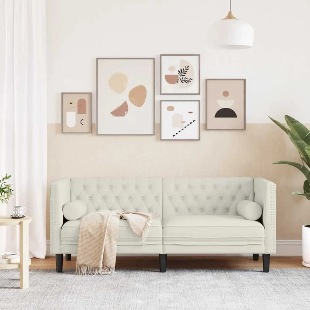 vidaXL Canapé Chesterfield avec traversins 2 places crème velours