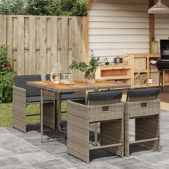 vidaXL Ensemble à manger de jardin 5 pcs coussins résine tressée