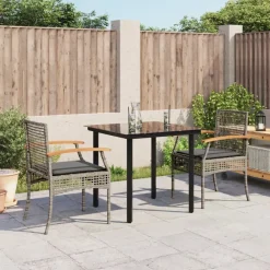 vidaXL Ensemble à manger de jardin 3 pcs coussins résine tressée