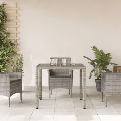 vidaXL Table de jardin dessus en verre 90x90x75 cm Résine tressée